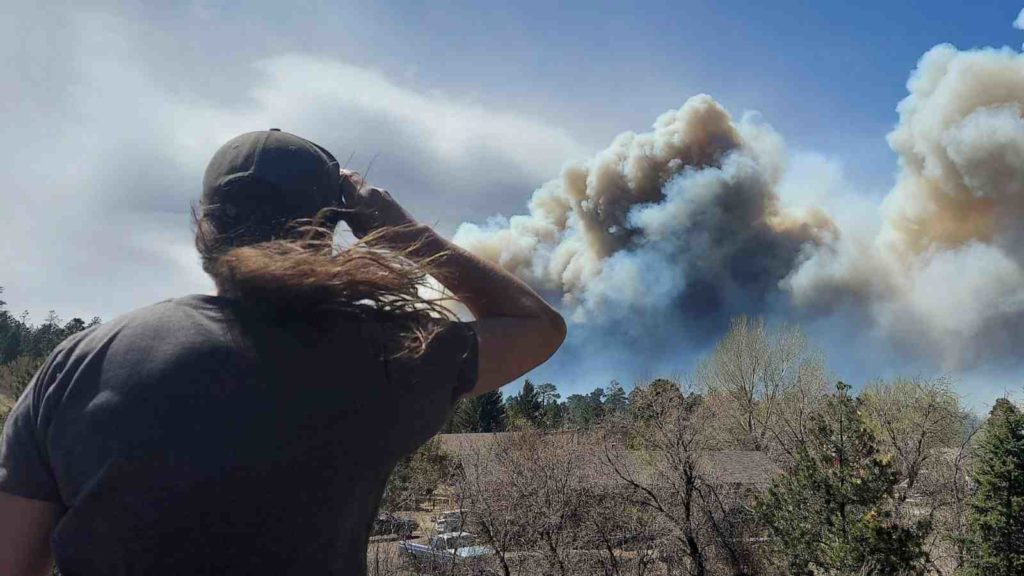 Western fires are forcing an evacuation in Arizona, California